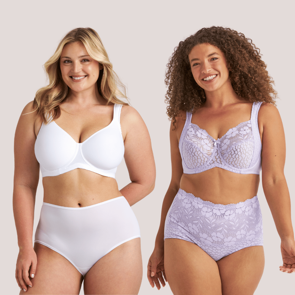 Two women modeling lingerie; one in white, the other in lavender lace, both smiling against a neutral background.